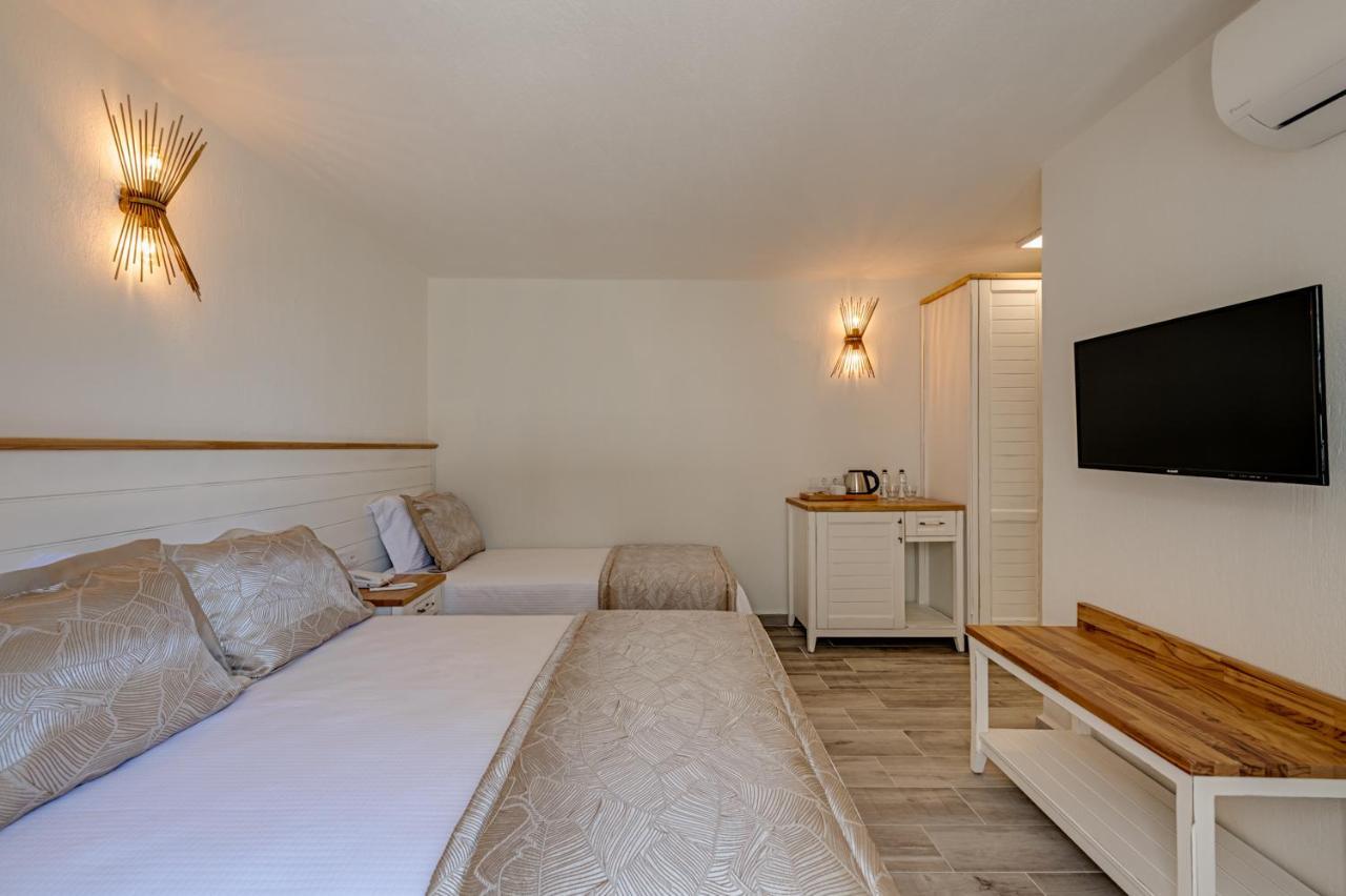 Deluxe Üç Kişilik Oda - Deniz Manzaralı
