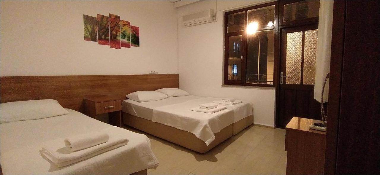Üç Kişilik Oda