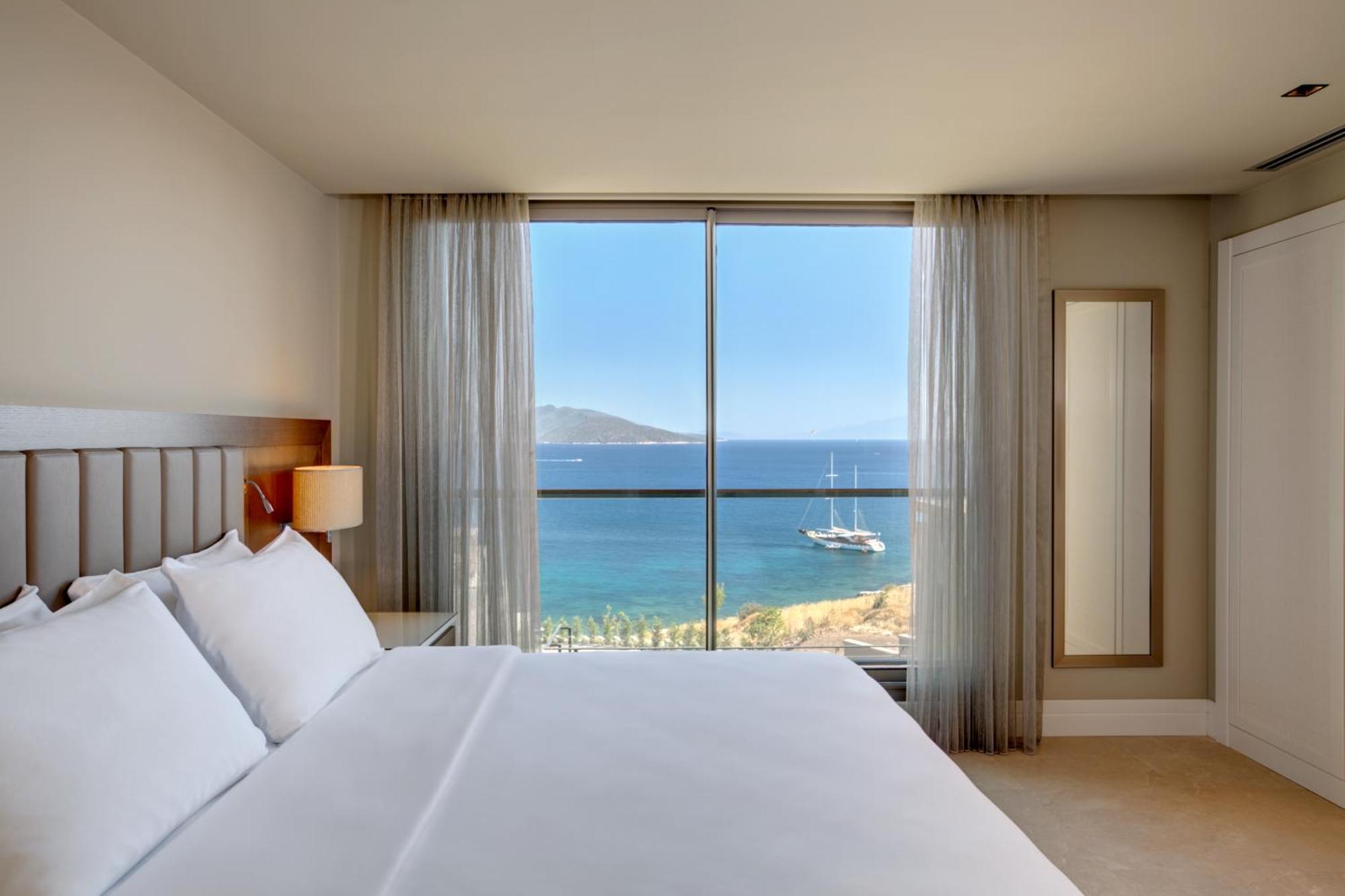 Residence Caresse mit 1 Schlafzimmer mit 1 Kingsize-Bett und Meerblick
