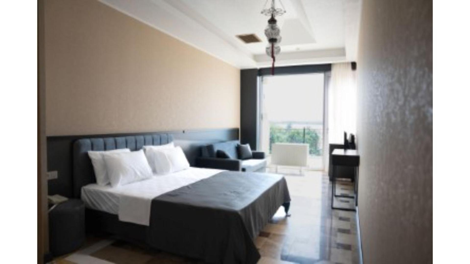 Deluxe Üç Kişilik Oda
