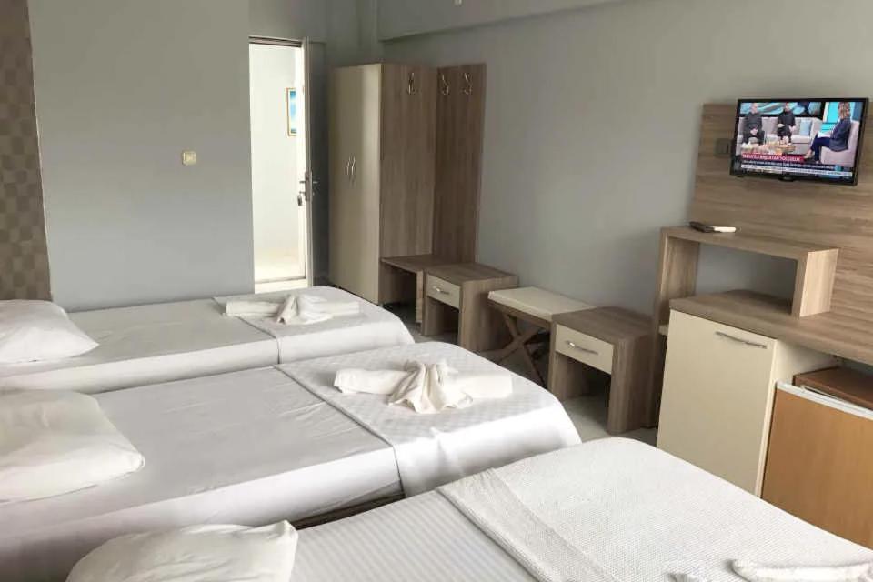 Üç Kişilik Oda